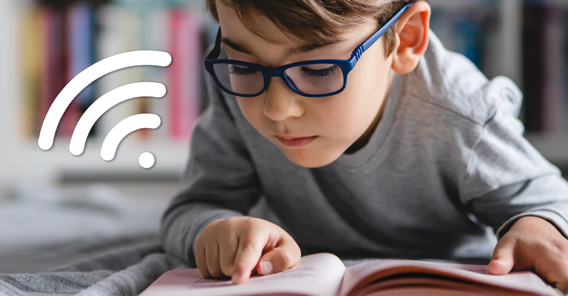 image of a boy reading a book that narrates the story