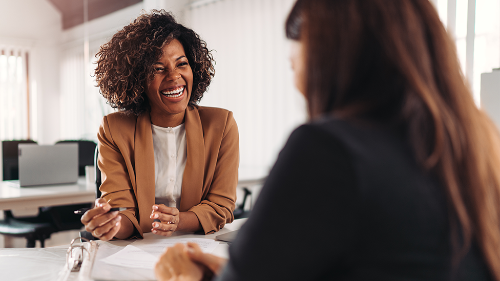 Female financial advisor consulting a client