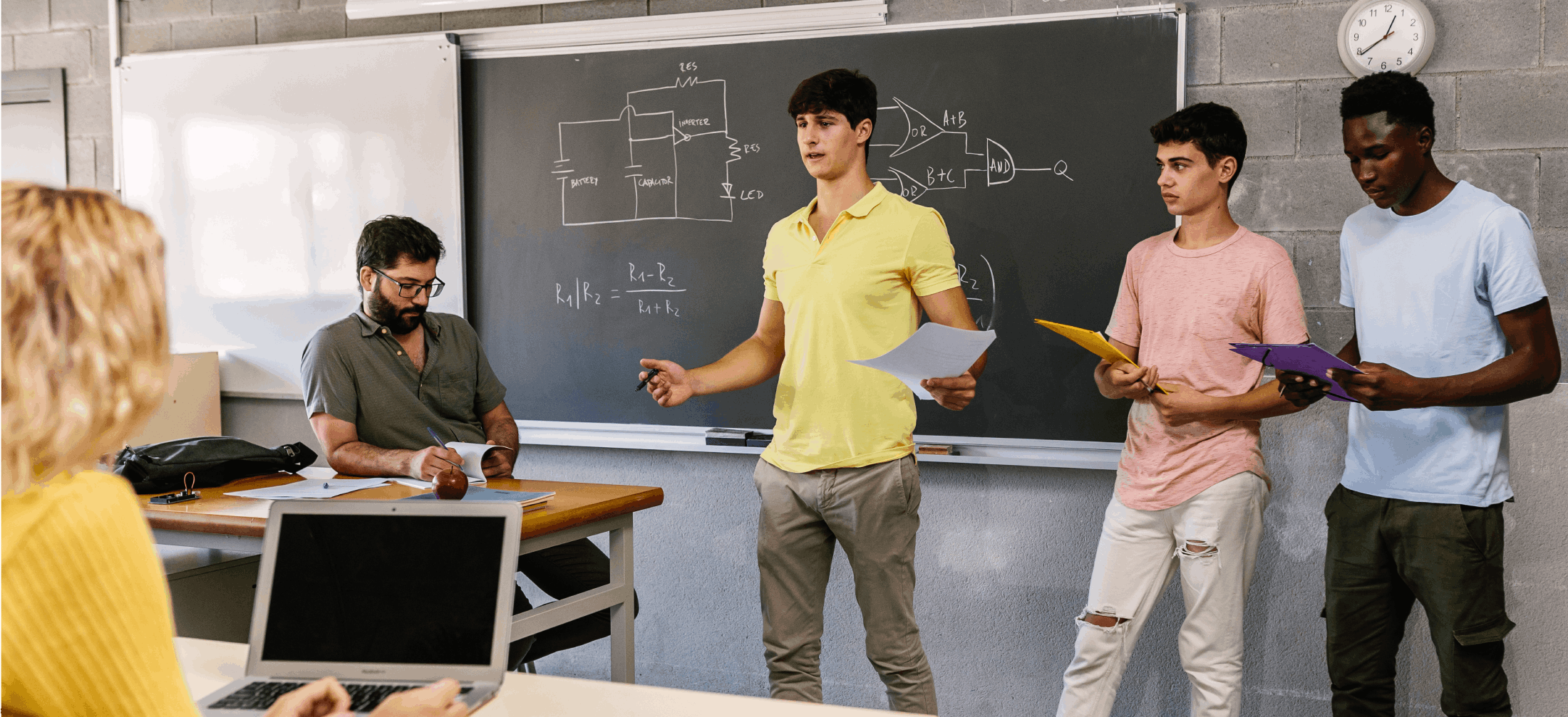 essential skills: three high schoolers give presentation