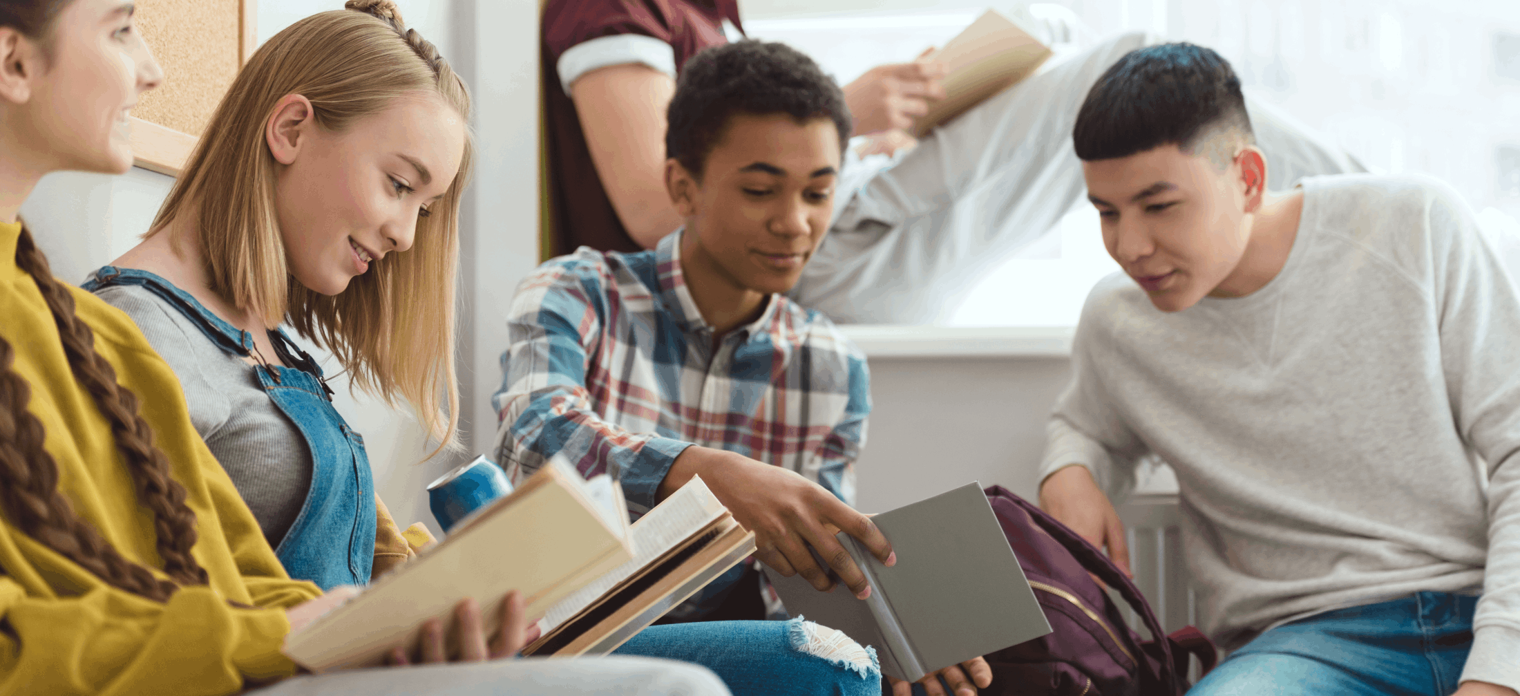 group of high schoolers reading